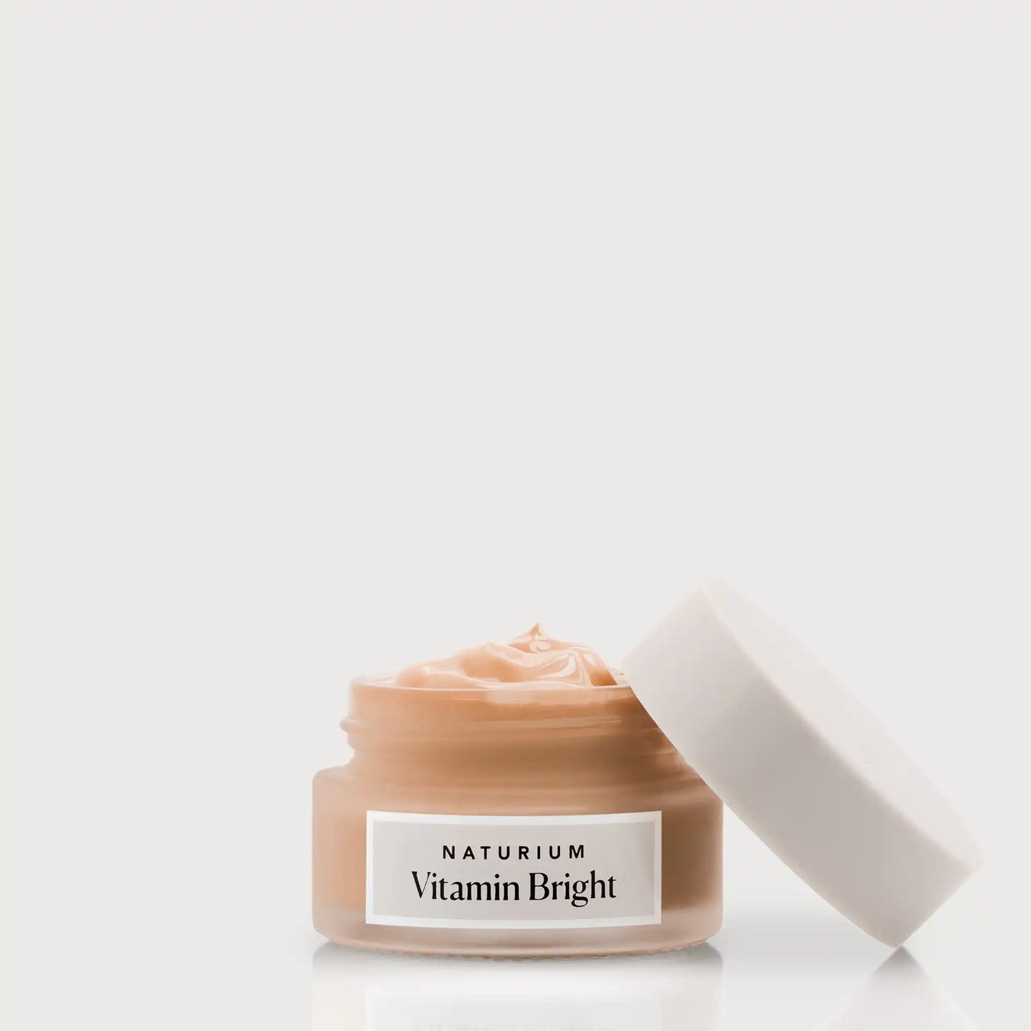 vitamin-bright-illuminating-eye-cream-t5 NATR-VitaminBright_DEEP_Primary_front_openjar_bone.webp