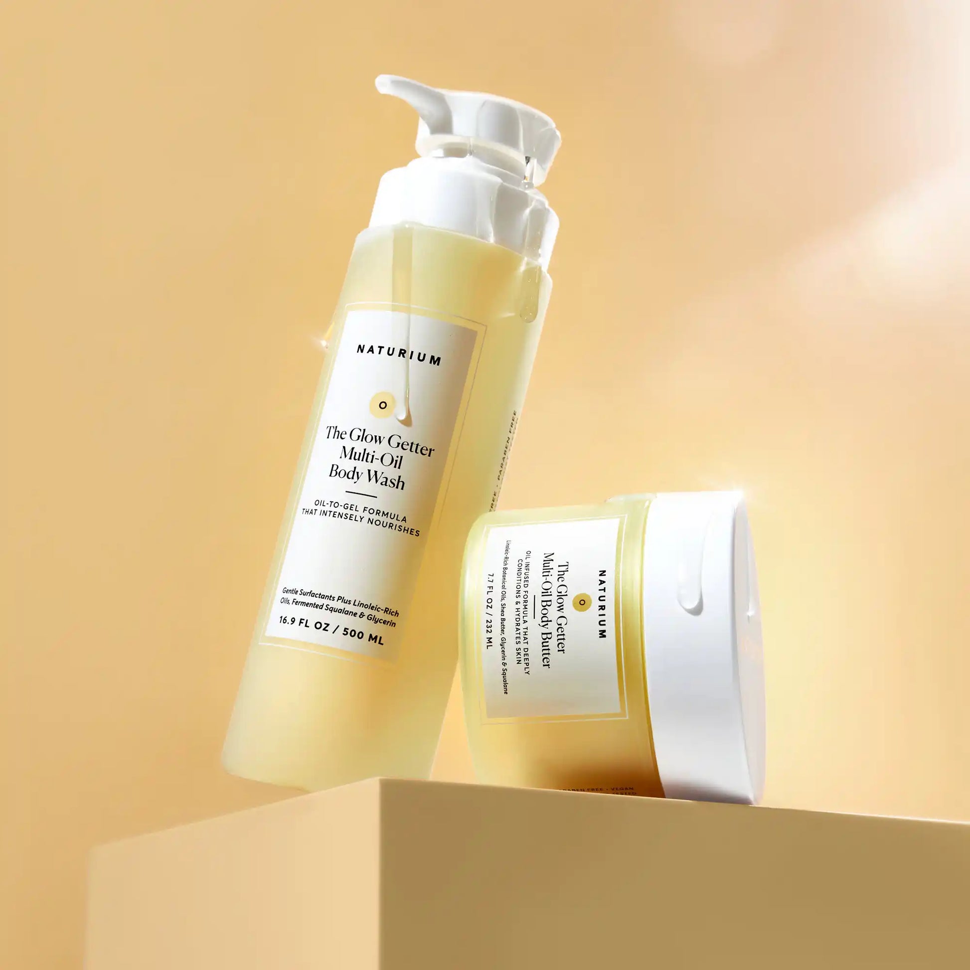 the-glow-all-out-body-bundle-g5 gg-bodybutter_1464-crop_revcolor_FL.webp